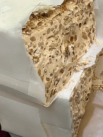 Blocks of Italian Torrone Cutting