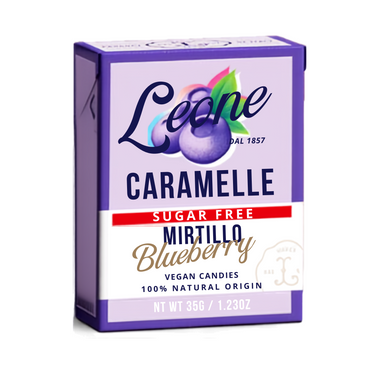 A box of Leane Caramelle sugar-free blueberry mirtillo vegan candies, featuring a purple and white packaging design with a red accent band.