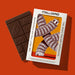 I Am Italiano Pisa coffee chocolate bar beside its illustrated wrapper on an orange background.
